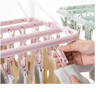 Uscator de rufe cu 32 de carlige, Pliabil, Rotire 360°, 32x32cm, Roz - Diversico